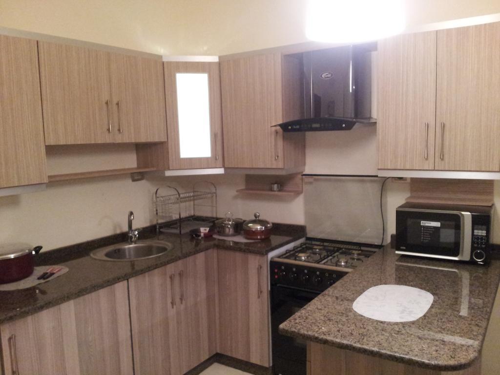 Cozy Dair Ghbar Apartment Амман Экстерьер фото